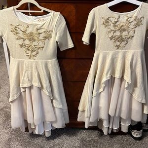 I am selling two Mia Joy dresses. Both a size 10.